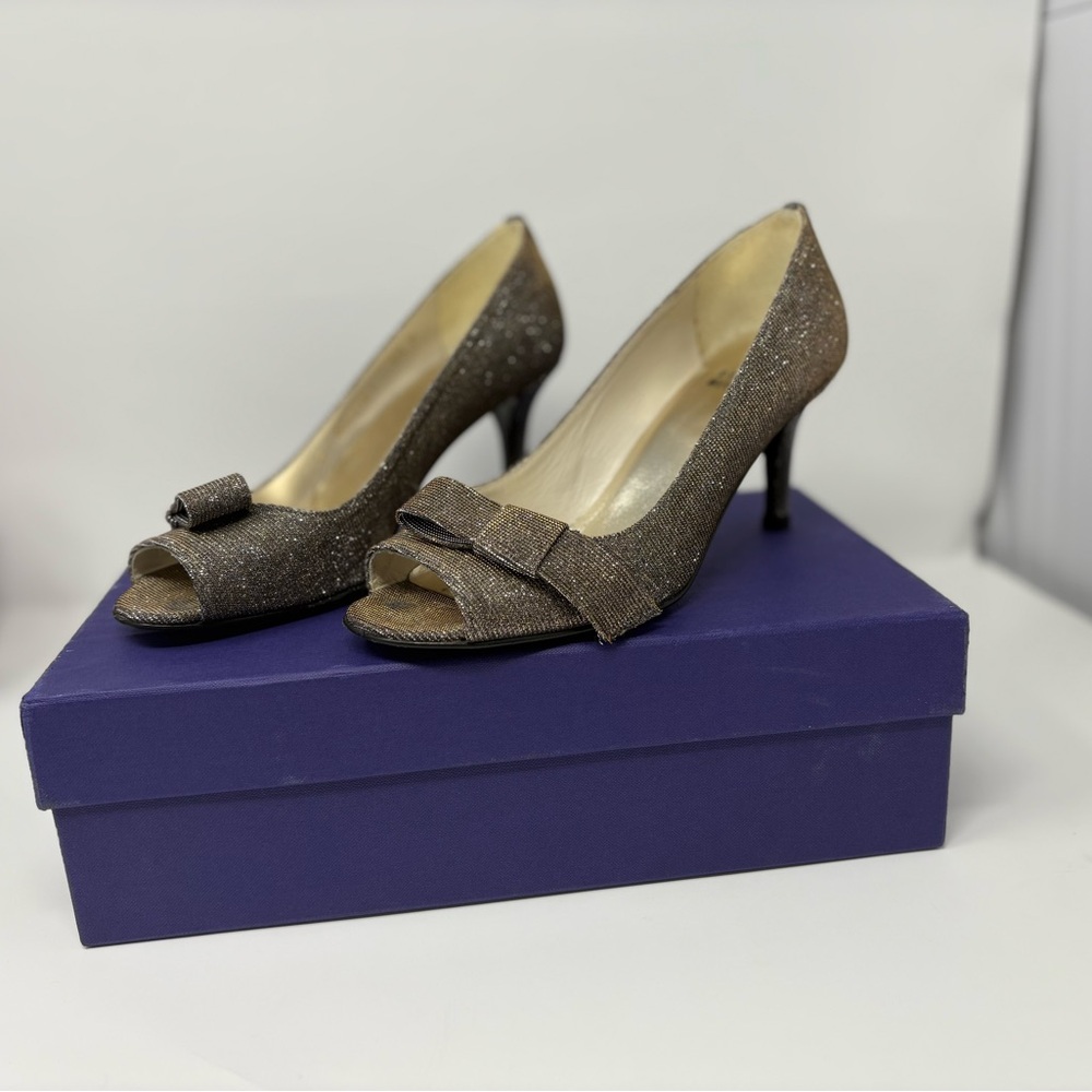 Stuart Weitzman shimmery peek toe heel with cute bow design